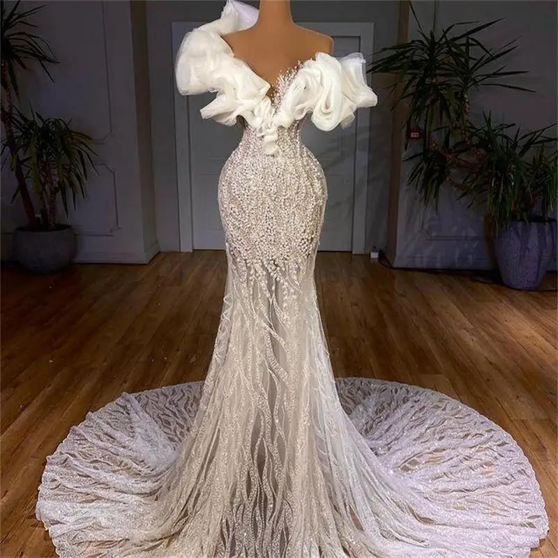 2021 Plus Size Mermaid Wedding Gowns Arabic Aso Ebi Luxurious Stylish Pearls Beaded Sheer Neck Sexy Bridal Gowns
2021 Plus Size Mermaid Wedding Gowns Arabic Aso Ebi Luxurious Stylish Pearls Beaded Sheer Neck Sexy Bridal Gowns
