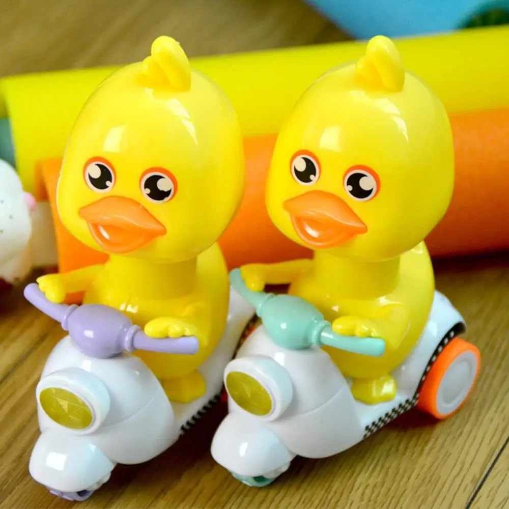 Дети мотоцикл пресс утка игрушка игрушки классическая Весенняя заводные для
