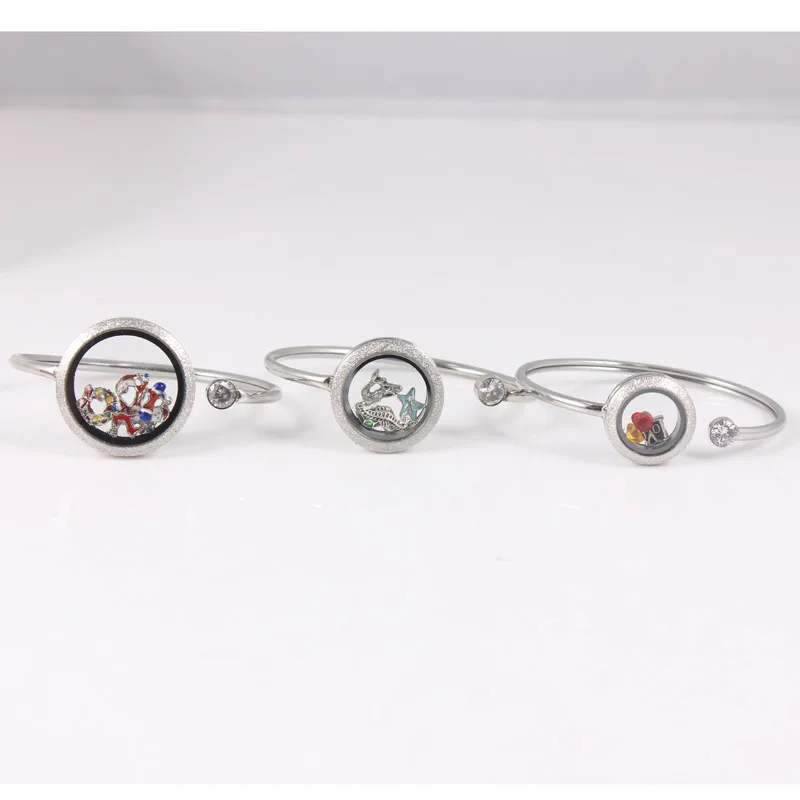 Wholesale Silver Sparkles Stainless Steel Twist Glass Floating Locket Bangle Open Bracelet With 20mm 25mm 30mm Living Locket
Wholesale Silver Sparkles Stainless Steel Twist Glass Floating Locket Bangle Open Bracelet With 20mm 25mm 30mm Living Locket
