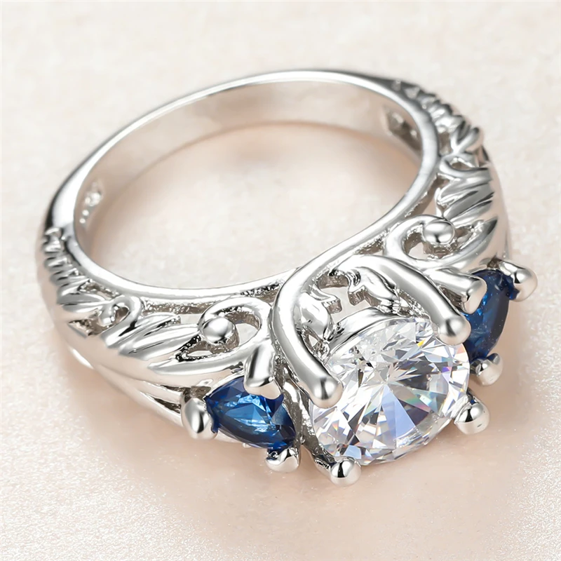 Trendy Female White Round Crystal Ring Charm Silver Color Flower Wedding Rings For Women Cute Blue Heart Zircon Engagement Ring
Trendy Female White Round Crystal Ring Charm Silver Color Flower Wedding Rings For Women Cute Blue Heart Zircon Engagement Ring