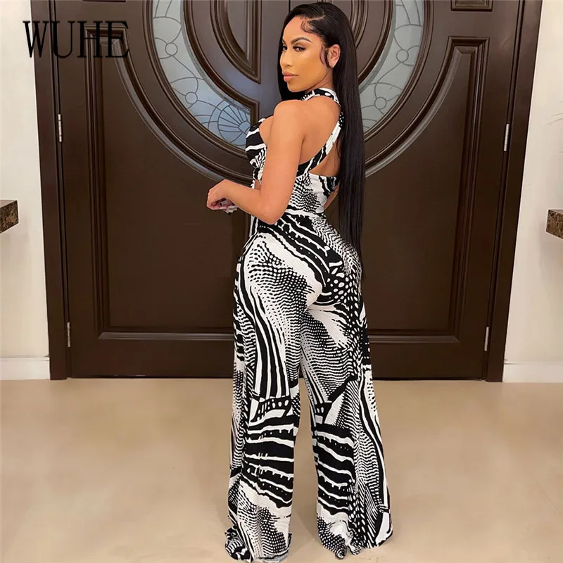 WUHE Patchwork Print Sleeveless Off Shoulder Sexy Hollow Out Halter Bandage Top and Wide Legs Pants Nightclub Two Piece Sets 
WUHE Patchwork Print Sleeveless Off Shoulder Sexy Hollow Out Halter Bandage Top and Wide Legs Pants Nightclub Two Piece Sets