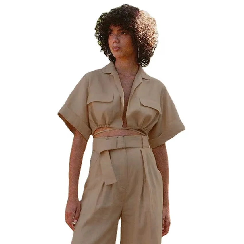 The new summer style retro lapel short sleeves tie up short style shirt belt zipper long wide-leg trouser suit
The new summer style retro lapel short sleeves tie up short style shirt belt zipper long wide-leg trouser suit
