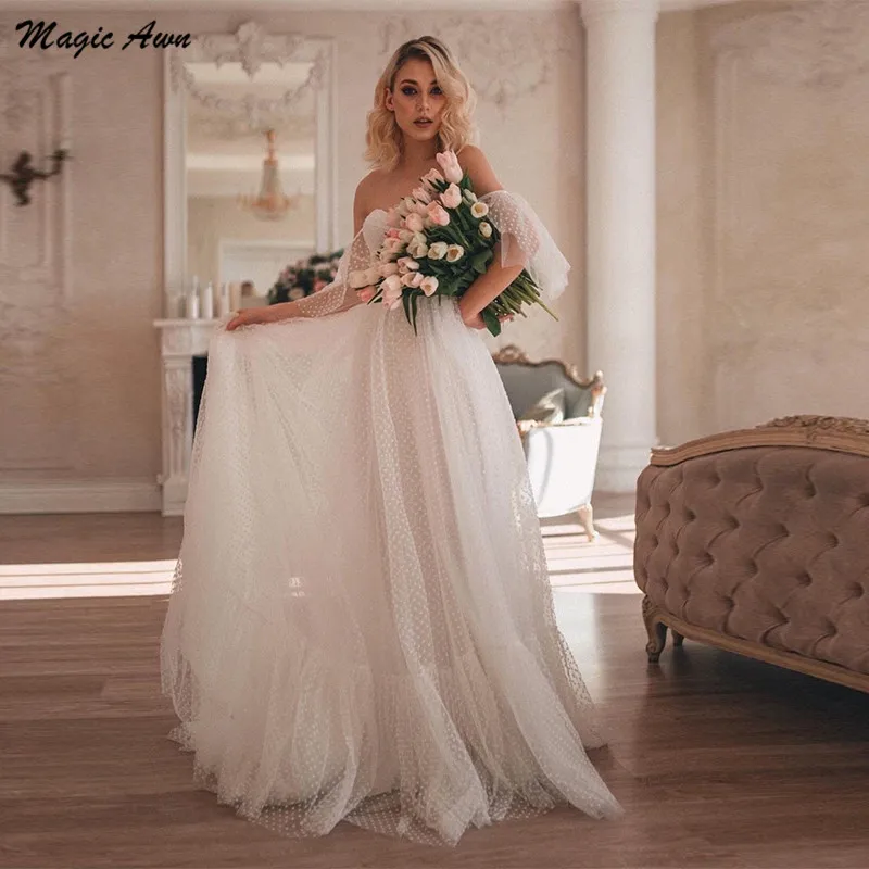Magic Awn Off The Shoulder Beach Wedding Dresses Polka Dots Tulle Short Sleeves Sweetheart Wedding Party Gowns Bohemian Vestidos
Magic Awn Off The Shoulder Beach Wedding Dresses Polka Dots Tulle Short Sleeves Sweetheart Wedding Party Gowns Bohemian Vestidos