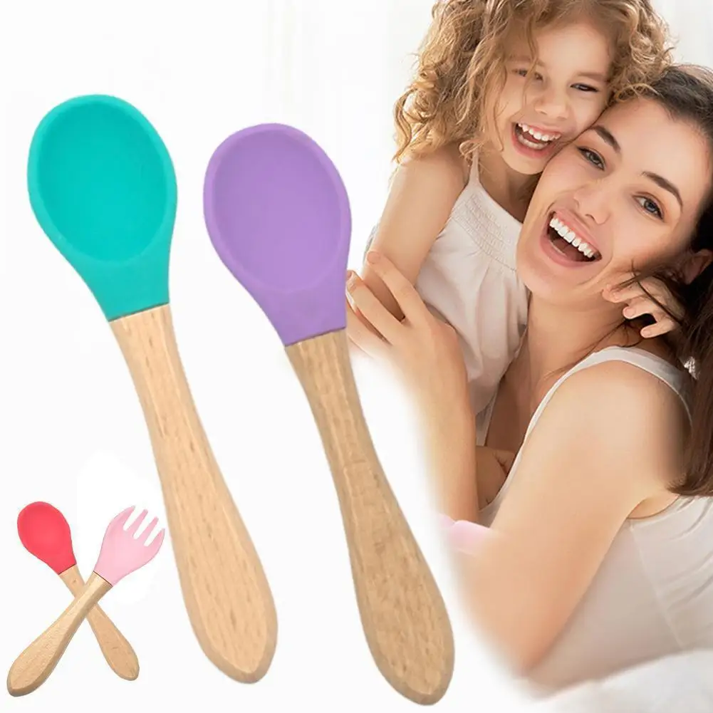 Toys For Girls Baby Silicone Tableware Wooden Handle Spoon Fork Safety Complementary Feeding Children's Flatware
Toys For Girls Baby Silicone Tableware Wooden Handle Spoon Fork Safety Complementary Feeding Children's Flatware