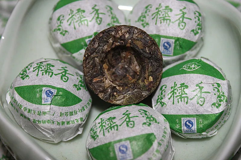 Yunnan Pu'er Tea Fragrance of Glutinous Rice Raw Tuo Glutinous Paper Compressed Mini Puer Tea
Yunnan Pu'er Tea Fragrance of Glutinous Rice Raw Tuo Glutinous Paper Compressed Mini Puer Tea