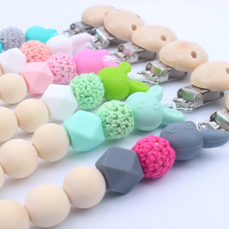 2019 Hot Sale Wooden Nipple Holder Clip Chain Wood Beads Love Heart Baby Girl Boy Teether Soother Pacifier Clips Leash Strap
2019 Hot Sale Wooden Nipple Holder Clip Chain Wood Beads Love Heart Baby Girl Boy Teether Soother Pacifier Clips Leash Strap