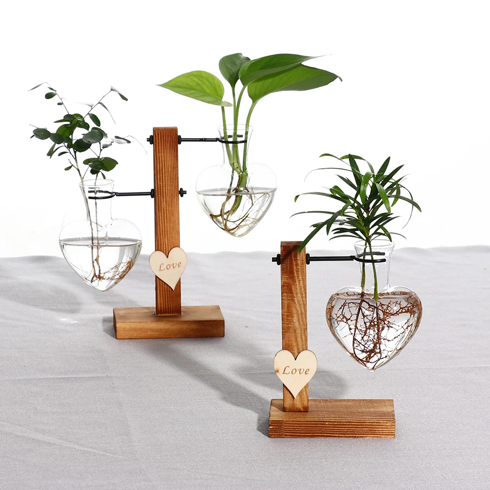 Nordic Style Glass Test Tube Flower Vase Wood Stand Glass Vase Heart Shape Romantic Hydroponic Plant Holder Bonsai Desktop Decor
Nordic Style Glass Test Tube Flower Vase Wood Stand Glass Vase Heart Shape Romantic Hydroponic Plant Holder Bonsai Desktop Decor