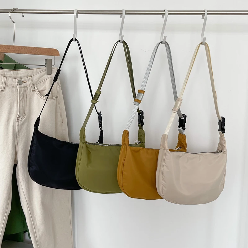 2021 New High Quality Nylon Zipper Women's Bag Preppy Style Ladies Hobo Phone Bag Japan Youth Shoulder Crossbody Bag Whole Sale
2021 New High Quality Nylon Zipper Women's Bag Preppy Style Ladies Hobo Phone Bag Japan Youth Shoulder Crossbody Bag Whole Sale