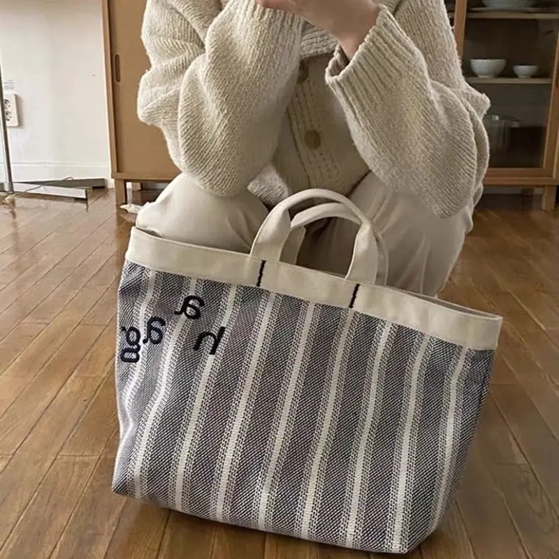 2021 New Big Vertical Strip Hand Bag Waterproof Canvas Bag Casual Letter Handbag Large Shopping Bag Women Bag
2021 New Big Vertical Strip Hand Bag Waterproof Canvas Bag Casual Letter Handbag Large Shopping Bag Women Bag