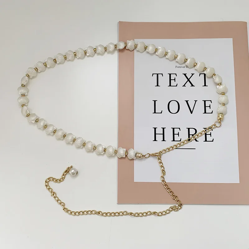 Женский ремень с металлической цепочкой, дизайнерский ремень с жемчужными подвесками и кисточками, роскошный пояс для женщин
Женский ремень с металлической цепочкой, дизайнерский ремень с жемчужными подвесками и кисточками, роскошный пояс для женщин