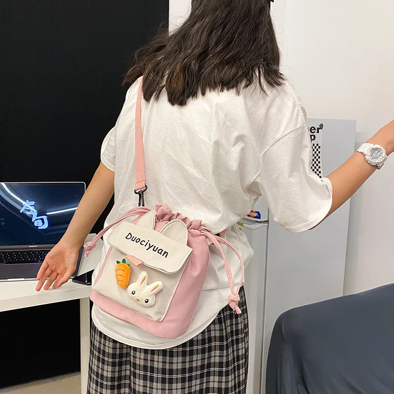 Японская Студенческая маленькая сумка на плечо ins для девушек, Женская милая сумка-мессенджер с кроличьими ушками и куклой на шнурке для жен...
Японская Студенческая маленькая сумка на плечо ins для девушек, Женская милая сумка-мессенджер с кроличьими ушками и куклой на шнурке для жен...