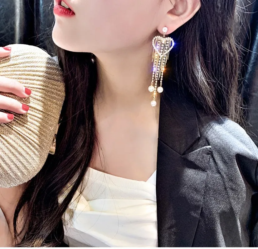 Earrings for women stud oorbellen hangers statement chain pendientes largos Heart crystal tassel trendy geometric Euro-American
Earrings for women stud oorbellen hangers statement chain pendientes largos Heart crystal tassel trendy geometric Euro-American