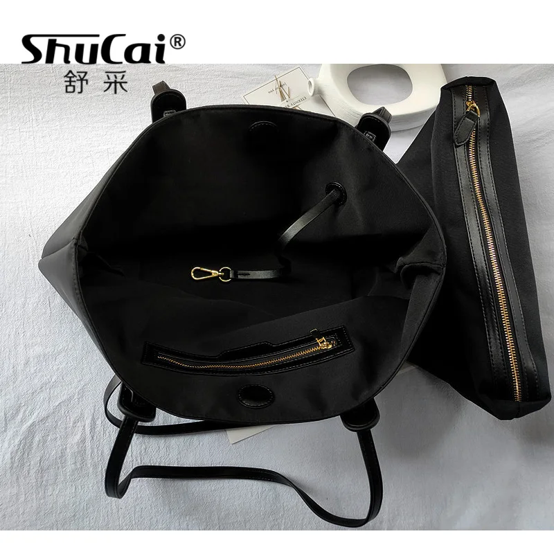Tote bag niche design, all-match nylon Oxford cloth with first layer cowhide shopping bag, shoulder bag female large capacity
Tote bag niche design, all-match nylon Oxford cloth with first layer cowhide shopping bag, shoulder bag female large capacity