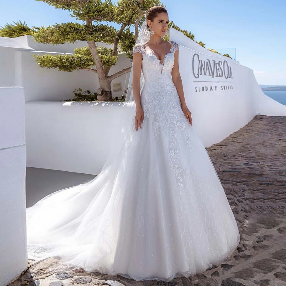 Gorgeous V-Neck Wedding Dresses 2021 Cap Sleeve Lace Appliques A-Line Sweep Train Tulle Civil Bridal Gown Vestidos De Noiva
Gorgeous V-Neck Wedding Dresses 2021 Cap Sleeve Lace Appliques A-Line Sweep Train Tulle Civil Bridal Gown Vestidos De Noiva