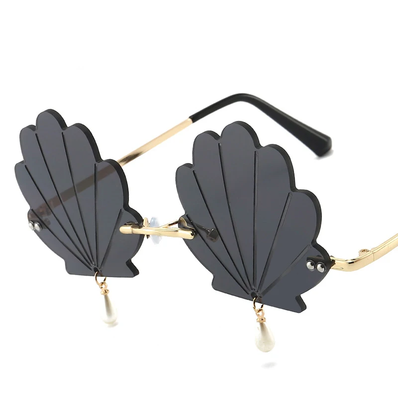 New Unique Rimless Shell Sunglasses Women Fashion Personality Pearl Sun Glasses Female Brand Design Outdoor Shades UV400 2021
New Unique Rimless Shell Sunglasses Women Fashion Personality Pearl Sun Glasses Female Brand Design Outdoor Shades UV400 2021