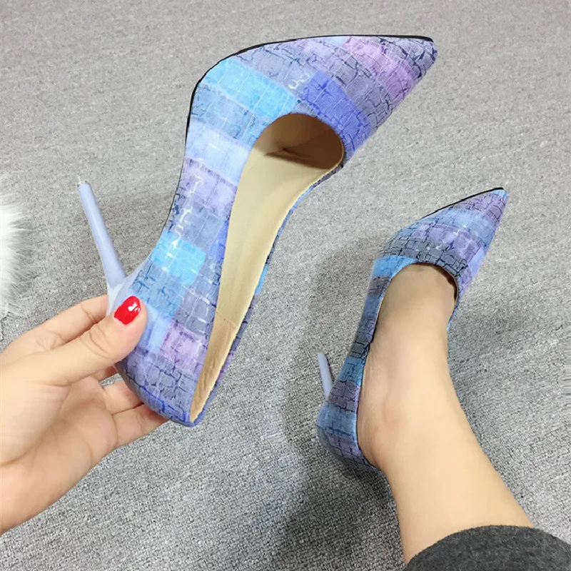 Spring red bottom leather surface pointed toe stiletto single shoes printing all-match dress large size working women's shoes 
Spring red bottom leather surface pointed toe stiletto single shoes printing all-match dress large size working women's shoes