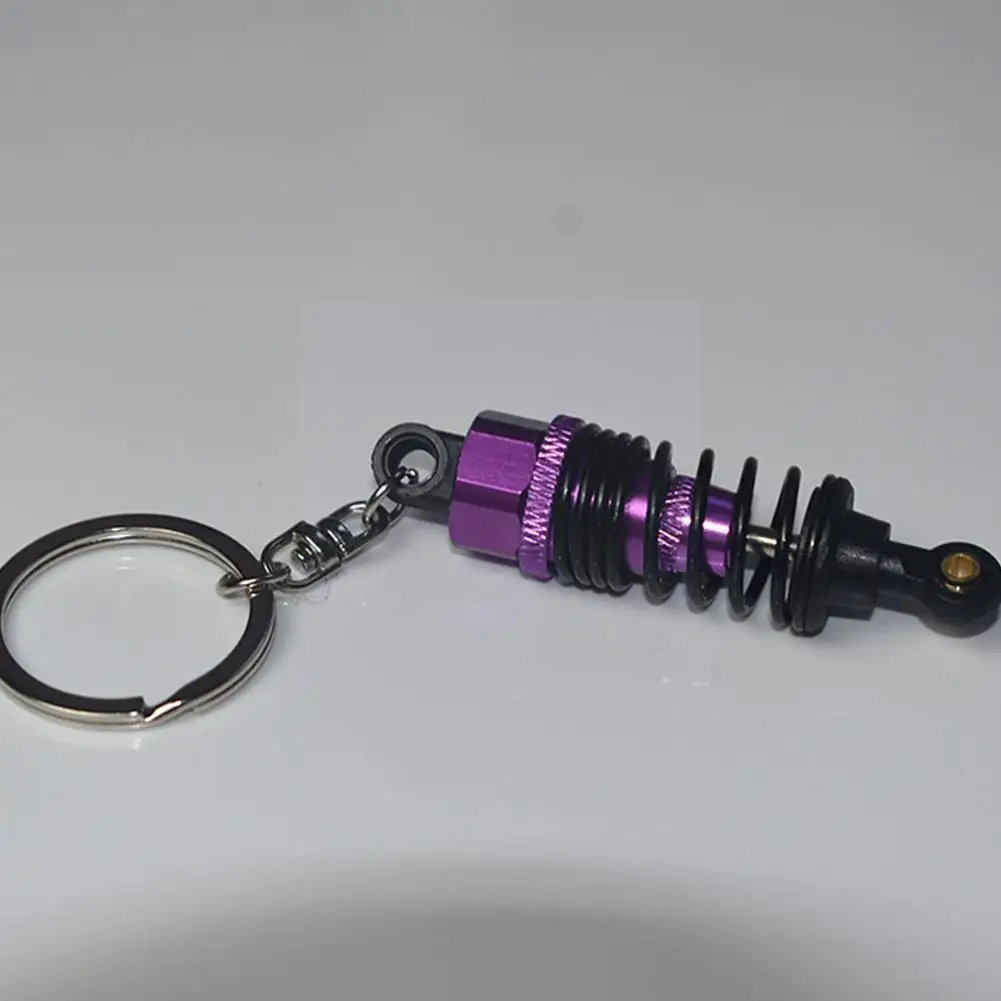 Scale Off Road Car Spring Shock Absorber Keychain Alloy Model keychain Pendant Car Damper Gift Accessories Y5I9
Scale Off Road Car Spring Shock Absorber Keychain Alloy Model keychain Pendant Car Damper Gift Accessories Y5I9