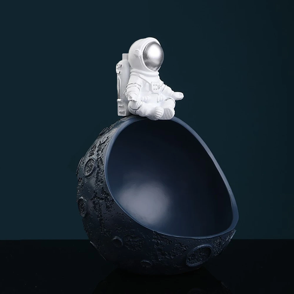 Creative Astronaut Resin Sculpture Key Storage Organizer Snack Box Spaceman Moon Model Living Room Decoration Planet Figurines
Creative Astronaut Resin Sculpture Key Storage Organizer Snack Box Spaceman Moon Model Living Room Decoration Planet Figurines