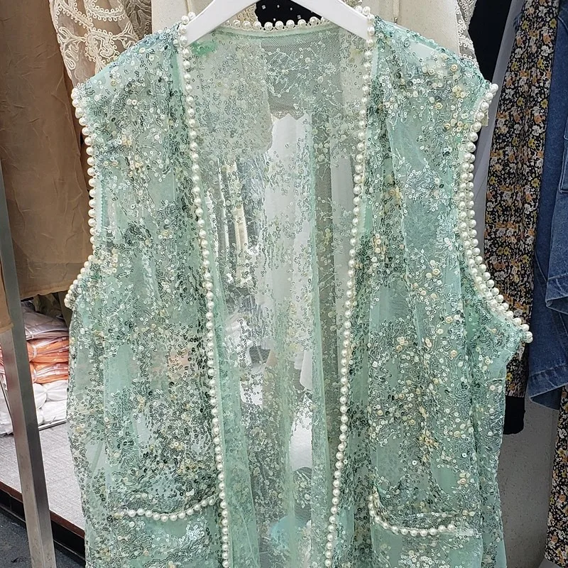 2020 summer new loose full body sequined pearl V-neck sleeveless vest jacket cardigan women
2020 summer new loose full body sequined pearl V-neck sleeveless vest jacket cardigan women