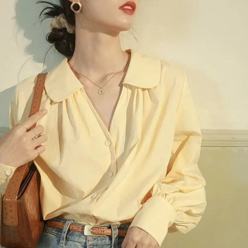 

Рубашка женская с длинным рукавом, белый желтый топ с воротником «Питер Пэн», на пуговицах, в ретро стиле, французская офисная блузка, весна-...