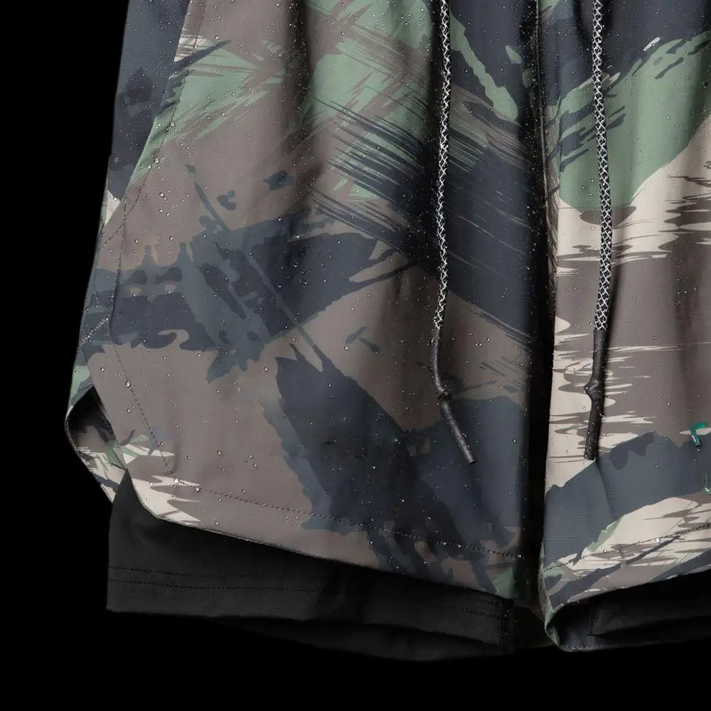 Summer new trend fitness double layer breathable shorts running sports fashion men's beach pants
Summer new trend fitness double layer breathable shorts running sports fashion men's beach pants