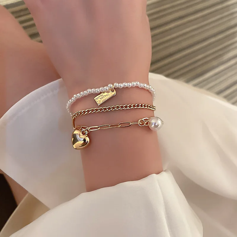 Pearl love multi-layer wear bracelet fashion elegant temperament hand jewelry
Pearl love multi-layer wear bracelet fashion elegant temperament hand jewelry