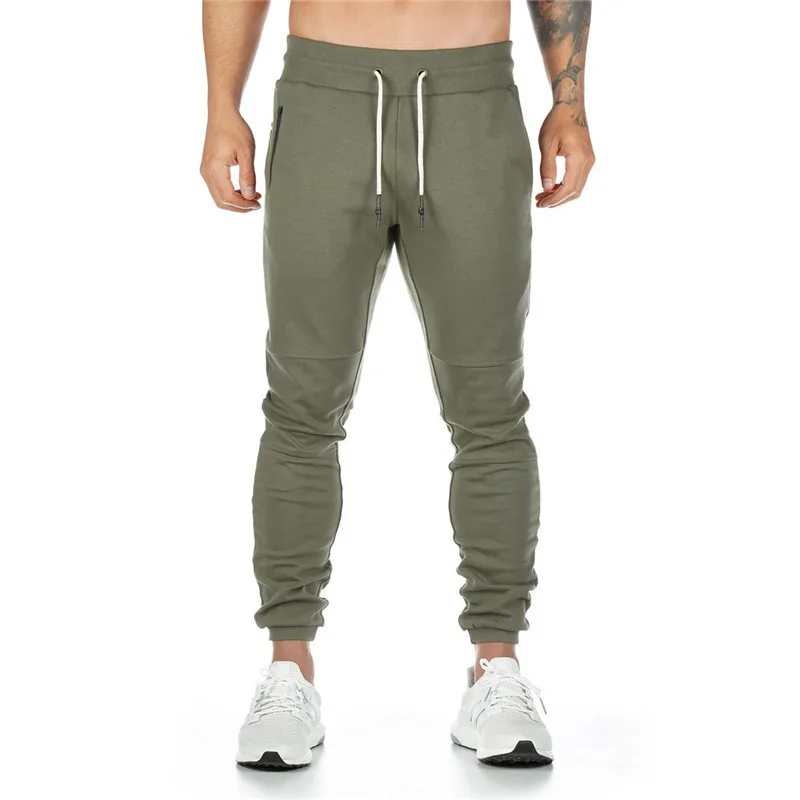 2021 Sports Men Gyms Pants Joggers Fitness pure color Long Pants Men Workout Skinny Sweatpants Jogger Running men Trousers 3XL
2021 Sports Men Gyms Pants Joggers Fitness pure color Long Pants Men Workout Skinny Sweatpants Jogger Running men Trousers 3XL