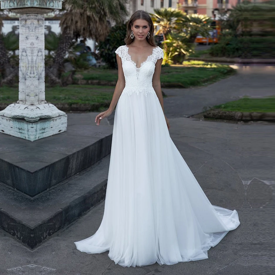 Bohemian Wedding Dress V-Neck Cap Sleeve A Line 2021 Boho Simple Bridal Gowns robe de soirée de mariage Bride Dresses
Bohemian Wedding Dress V-Neck Cap Sleeve A Line 2021 Boho Simple Bridal Gowns robe de soirée de mariage Bride Dresses