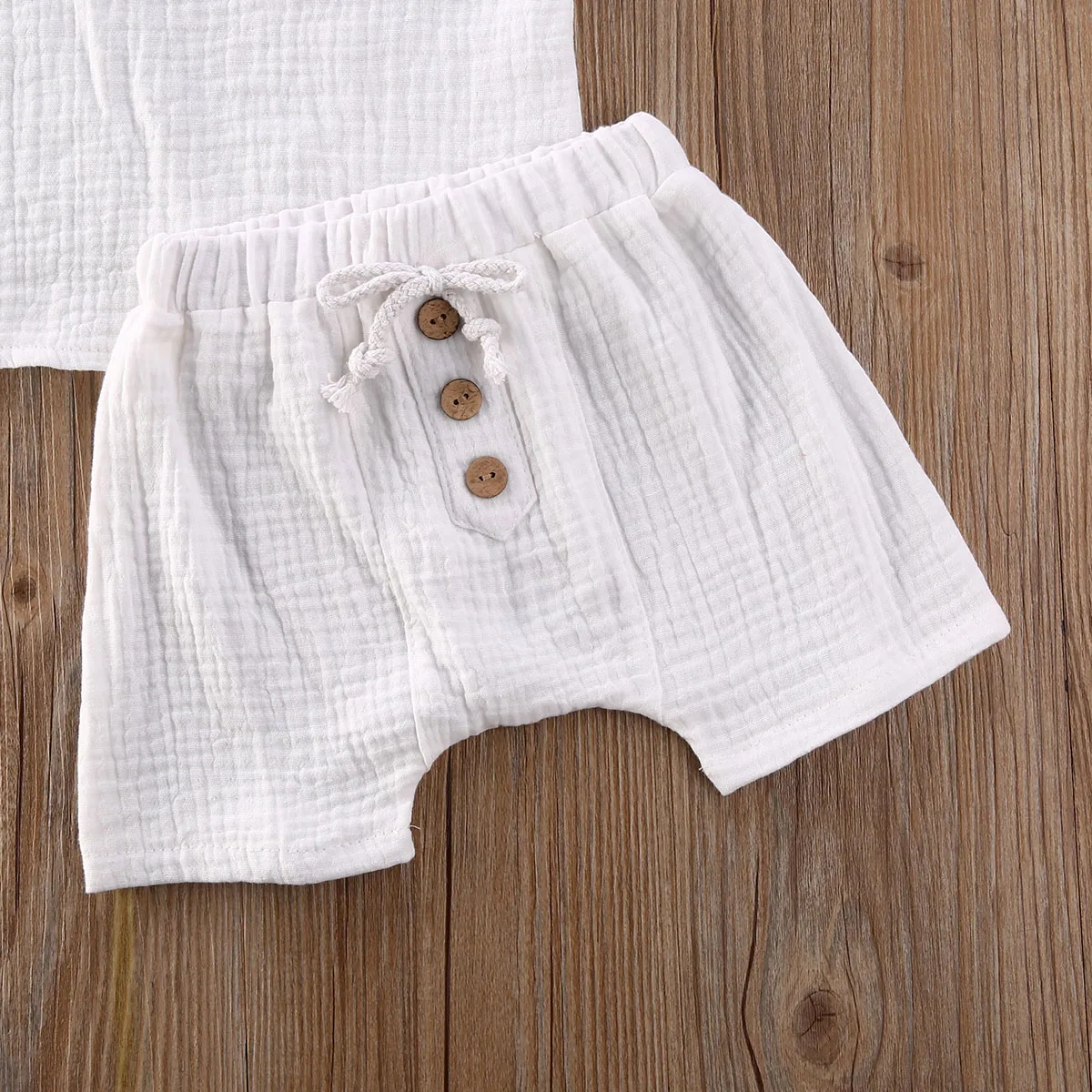 New 0-24M Baby Girls Boys Botton Clothes Outfits Cotton Summer Kids Short Sleeve Tops T-Shirts+Shorts Suits
New 0-24M Baby Girls Boys Botton Clothes Outfits Cotton Summer Kids Short Sleeve Tops T-Shirts+Shorts Suits
