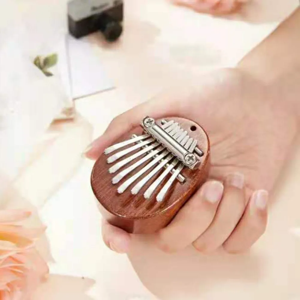 Newest Mini 8 Key Kalimba Thumb Piano Nice Sound Finger Keyboard Musical Hand Toys Gifts Musical Instrument Wooden Lightweight
Newest Mini 8 Key Kalimba Thumb Piano Nice Sound Finger Keyboard Musical Hand Toys Gifts Musical Instrument Wooden Lightweight