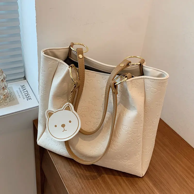 PUwomen's Bag 2021 One-shoulder Large-capacity Tote Bag Embossed High-quality Texture Large Bag Women's New Fashion Women's Bag
PUwomen's Bag 2021 One-shoulder Large-capacity Tote Bag Embossed High-quality Texture Large Bag Women's New Fashion Women's Bag