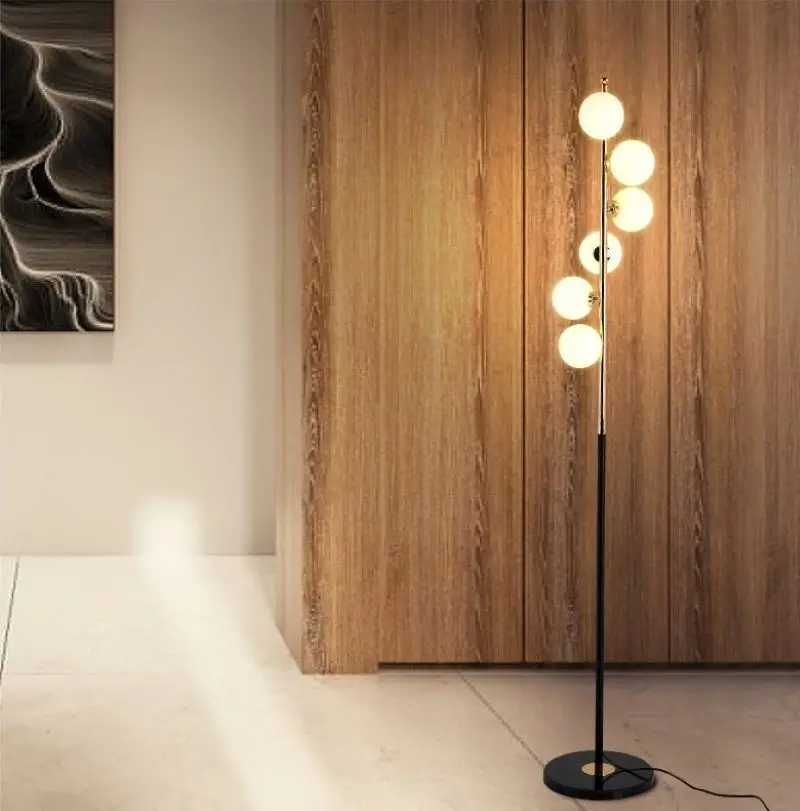 European modern simple floor lamp living room glass ball bedroom creative art home decoration lamp
European modern simple floor lamp living room glass ball bedroom creative art home decoration lamp