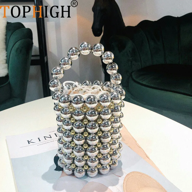 Женская плетеная Сумка TOPHIGH с жемчугом, лидер продаж 2021, сумка ручной работы с бусинами, сумка на плечо для женщин, новая модная сумка-мешок
Женская плетеная Сумка TOPHIGH с жемчугом, лидер продаж 2021, сумка ручной работы с бусинами, сумка на плечо для женщин, новая модная сумка-мешок