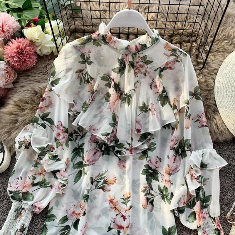 Stand Collar Chiffon Shirt WomenAutumn Puff Sleeve Floral Print Ruffles Blouse Loose Sweet Holiday Beach Blusas Shirts 
Stand Collar Chiffon Shirt WomenAutumn Puff Sleeve Floral Print Ruffles Blouse Loose Sweet Holiday Beach Blusas Shirts