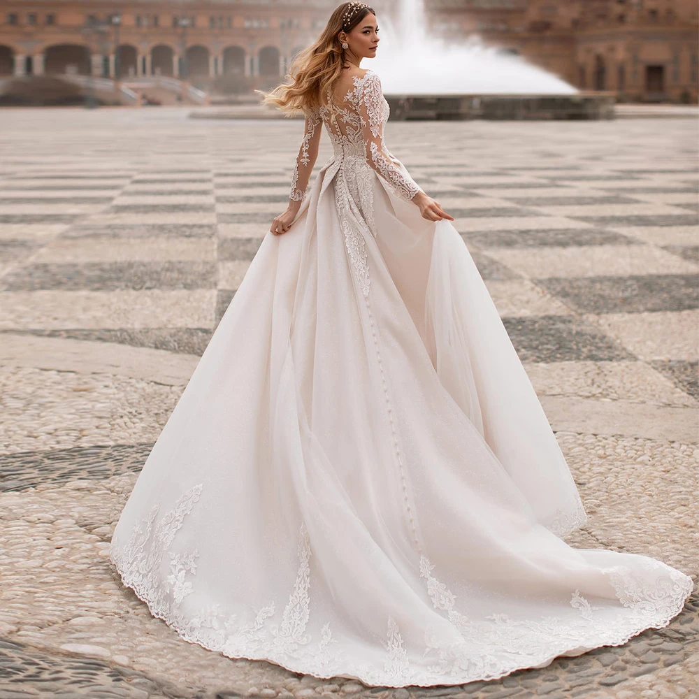 Vestidos Elegant Wedding Dresses Tulle Appliques Pleat Bateau Full Sleeve Covered Button Ball Bridal Gowns 2021
Vestidos Elegant Wedding Dresses Tulle Appliques Pleat Bateau Full Sleeve Covered Button Ball Bridal Gowns 2021