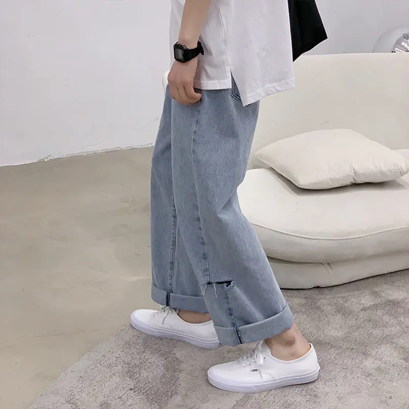 Hole jeans female students summer Korean new style daddy straight tube loose high waist show thin wide leg pants trend
Hole jeans female students summer Korean new style daddy straight tube loose high waist show thin wide leg pants trend