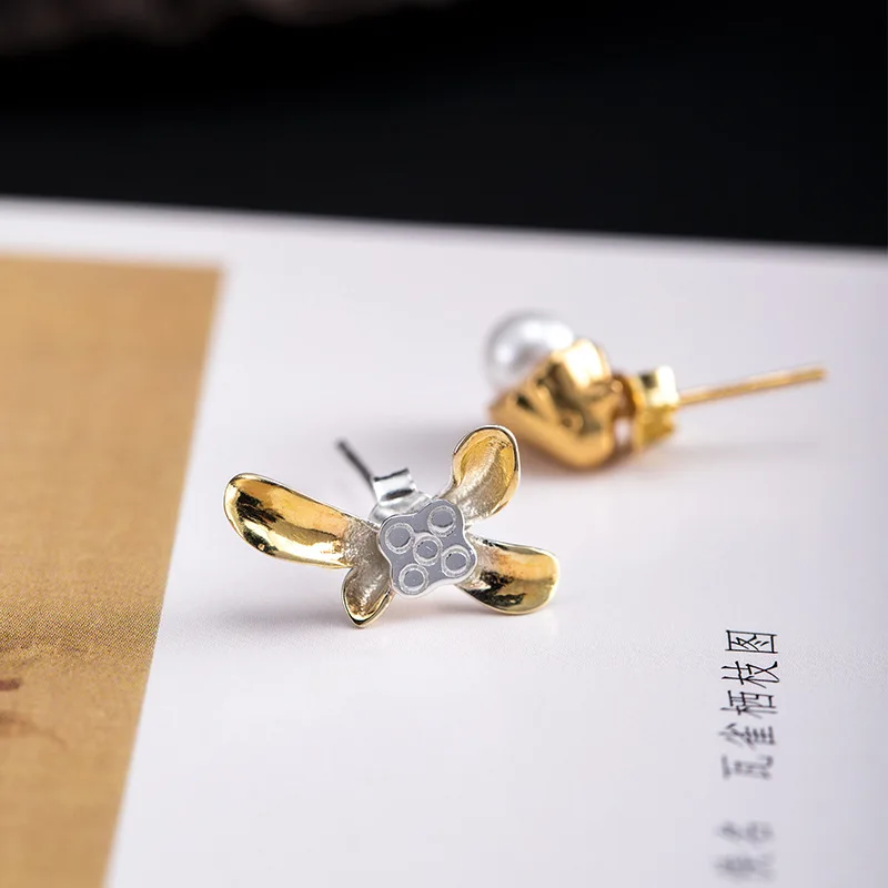 100% S925 Sterling Silver Pearl earrings female new trendy short retro country style irregular two-color stud earrings
100% S925 Sterling Silver Pearl earrings female new trendy short retro country style irregular two-color stud earrings