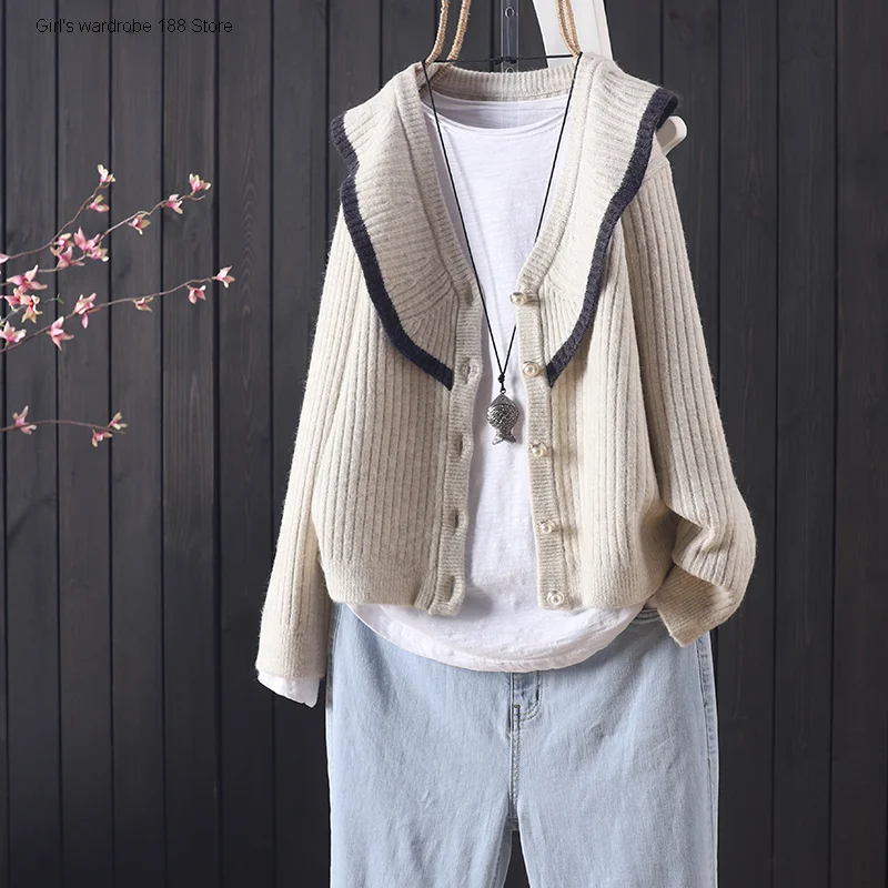Collection of autumn new lotus leaf collar solid color core spun yarn embroidery knitted cardigan women's long sleeve
Collection of autumn new lotus leaf collar solid color core spun yarn embroidery knitted cardigan women's long sleeve