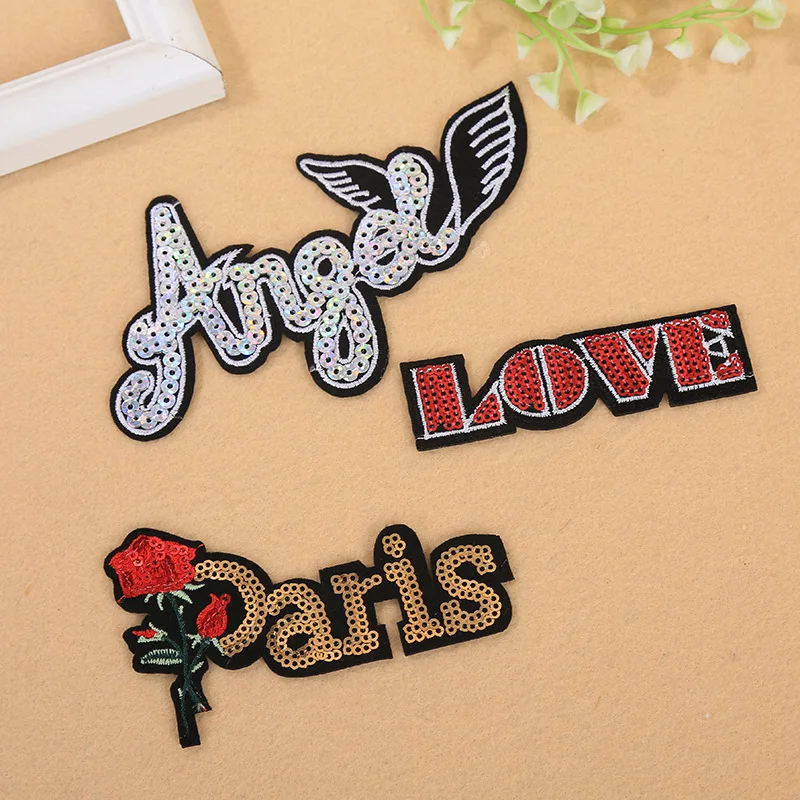 100 Pcs/lot Embroidery Patch Letter Iron Sequin Applique Stickers Iron Angel Wing Wholesale Bag Clothing Sewing Accessories
100 Pcs/lot Embroidery Patch Letter Iron Sequin Applique Stickers Iron Angel Wing Wholesale Bag Clothing Sewing Accessories
