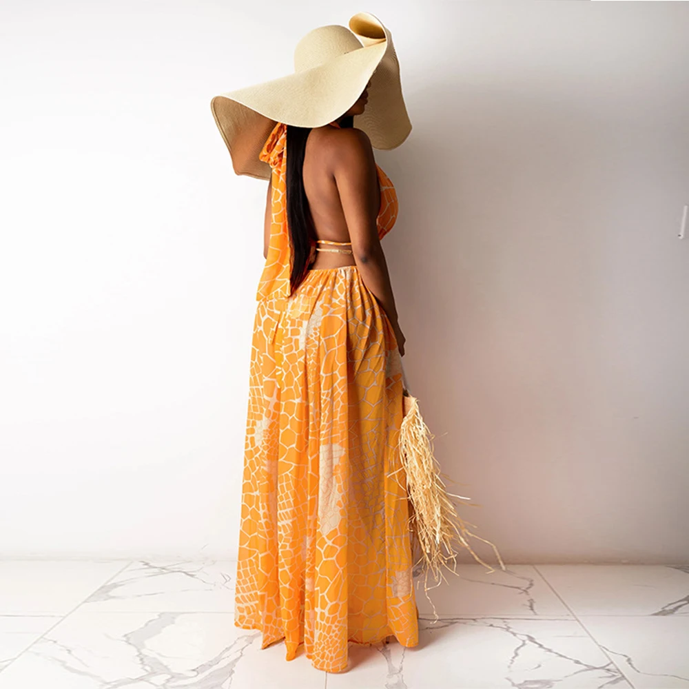 Женская летняя пляжная юбка с лямкой на шее и разрезом сбоку 
Женская летняя пляжная юбка с лямкой на шее и разрезом сбоку