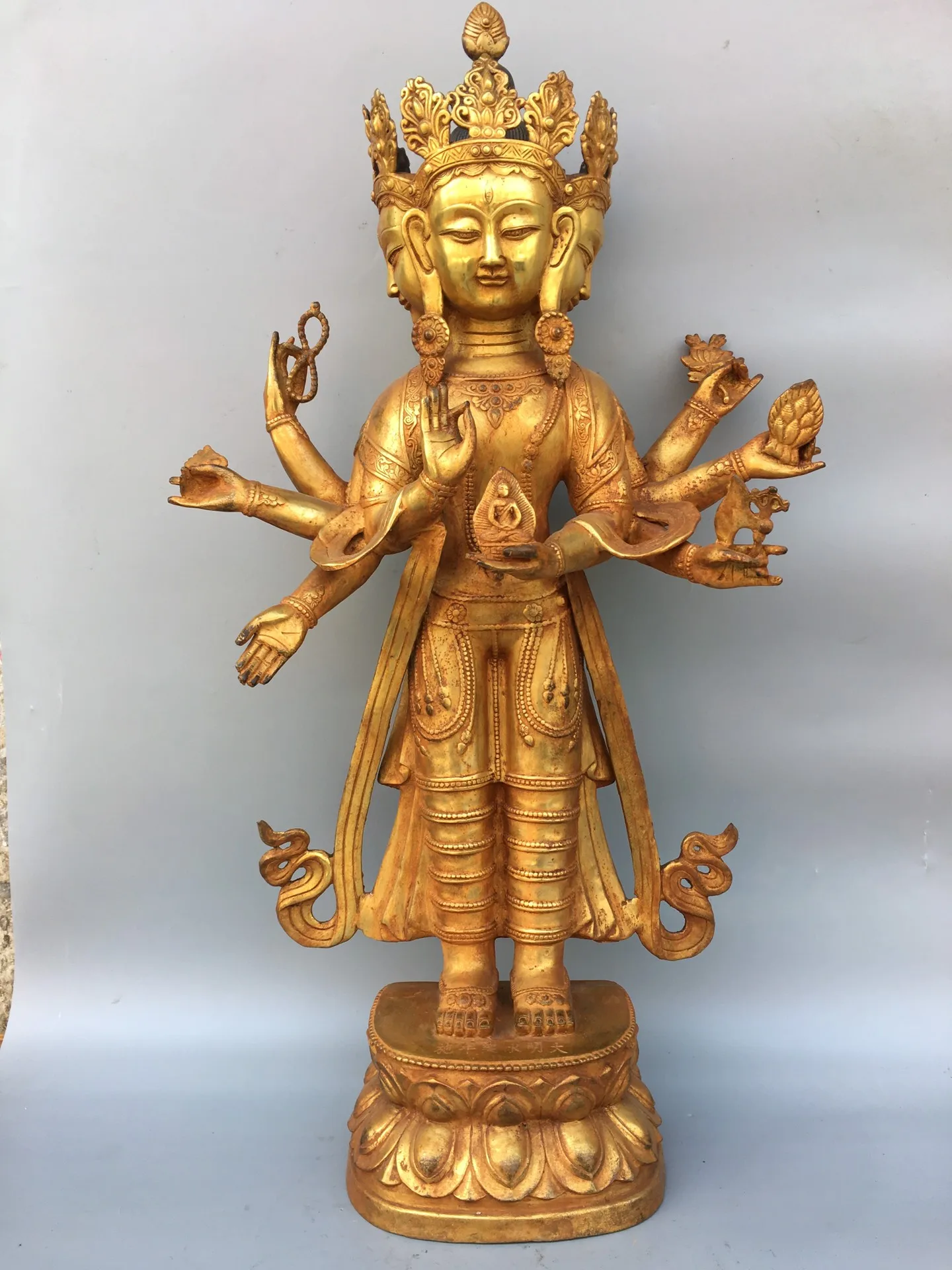 28"Tibet Buddhism Old Bronze Gilt Four heads and eight arms Holy Buddha Standing Buddha Enshrine the Buddha
28"Tibet Buddhism Old Bronze Gilt Four heads and eight arms Holy Buddha Standing Buddha Enshrine the Buddha