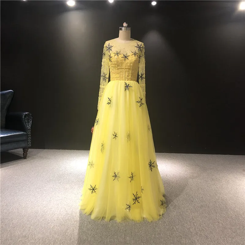 Новейшие высококачественные роскошные вечерние платья до пола желтого цвета с длинными рукавами и круглым вырезом
Новейшие высококачественные роскошные вечерние платья до пола желтого цвета с длинными рукавами и круглым вырезом