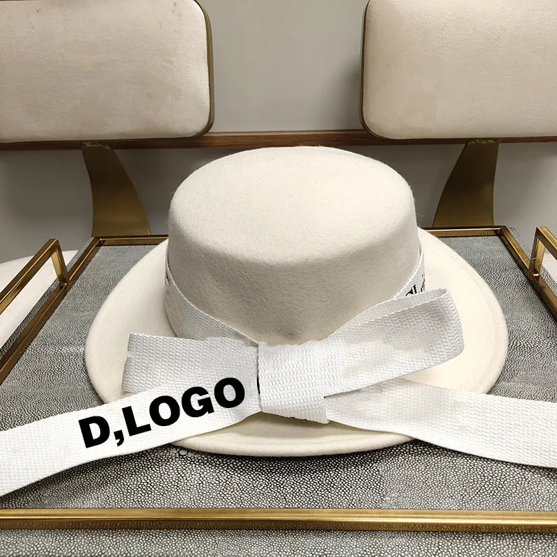 Japanese simple fashion flat top bow d letter European and American retro elegant vacation wool hat
Japanese simple fashion flat top bow d letter European and American retro elegant vacation wool hat