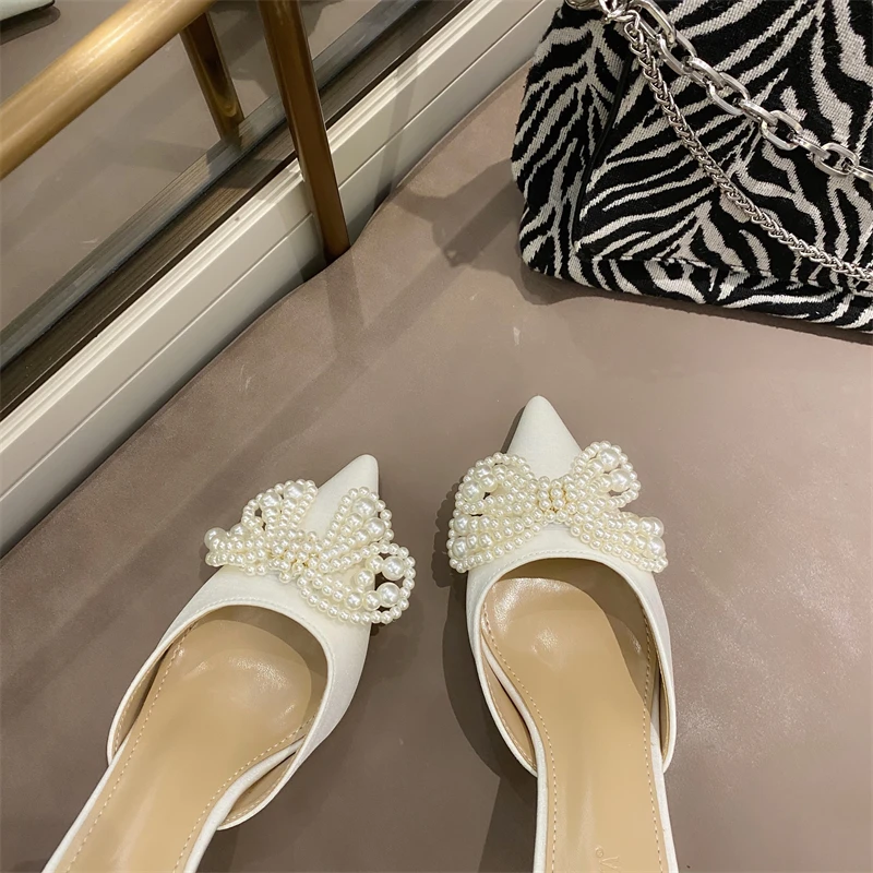 Fairy style Baotou half-drag women's outer wear 2021 autumn new French bow stiletto heel fashion all-match pointed sandals
Fairy style Baotou half-drag women's outer wear 2021 autumn new French bow stiletto heel fashion all-match pointed sandals