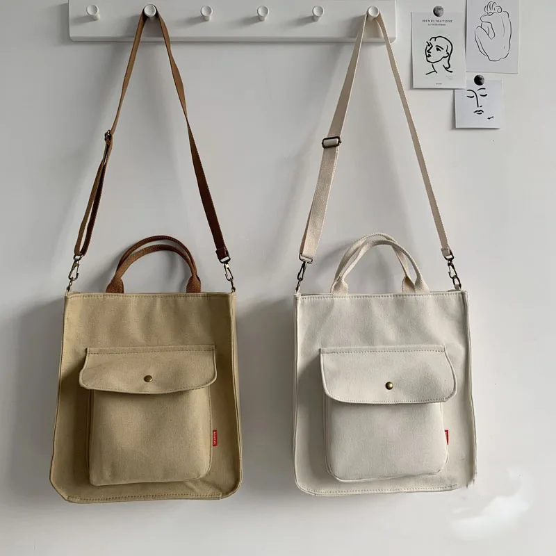 Однотонная Повседневная Сумка-тоут, портативные студенческие сумки через плечо для колледжа, простая женская сумка, простая Холщовая Сумка...
Однотонная Повседневная Сумка-тоут, портативные студенческие сумки через плечо для колледжа, простая женская сумка, простая Холщовая Сумка...