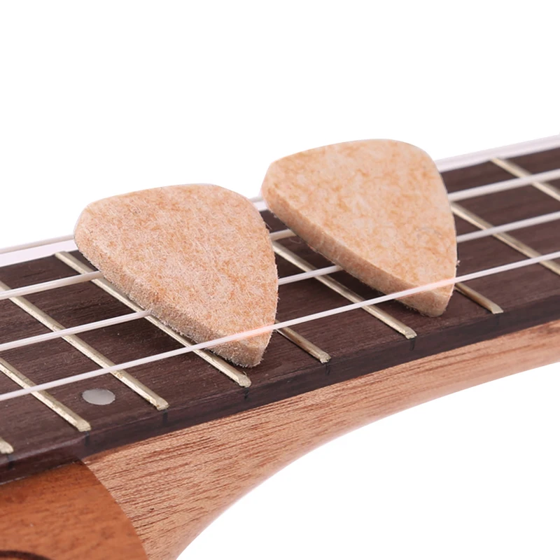 New 5pcs Soft Hard Ukulele Wool Felt Picks ACCS 3MM Mandolin Guitar Plectrums 
New 5pcs Soft Hard Ukulele Wool Felt Picks ACCS 3MM Mandolin Guitar Plectrums