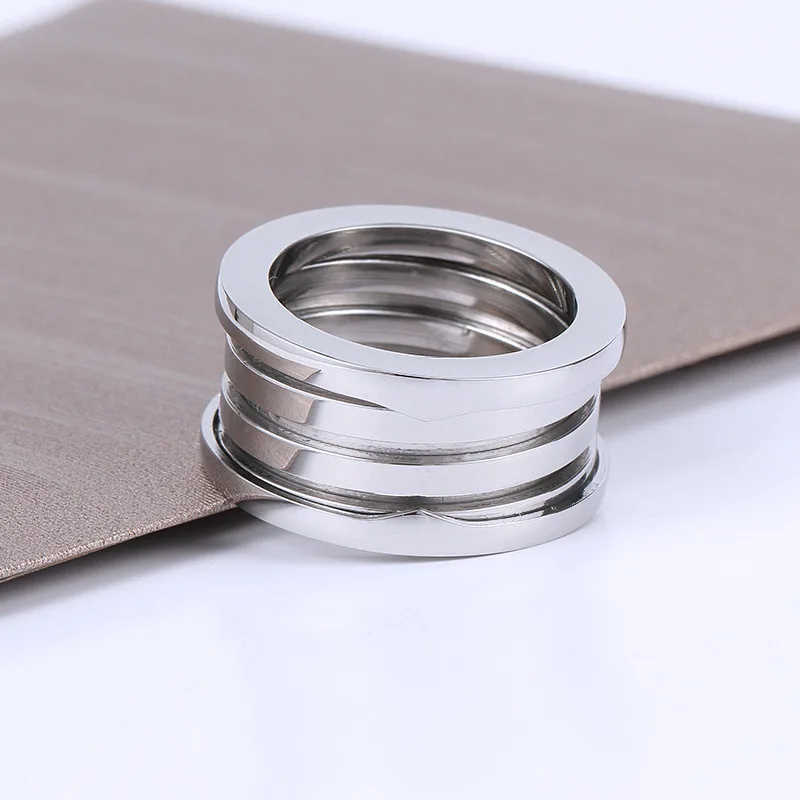 Original high-end titanium steel spring ring for men and women fashion brand jewelry BV ring engagement ring party free delivery
Original high-end titanium steel spring ring for men and women fashion brand jewelry BV ring engagement ring party free delivery