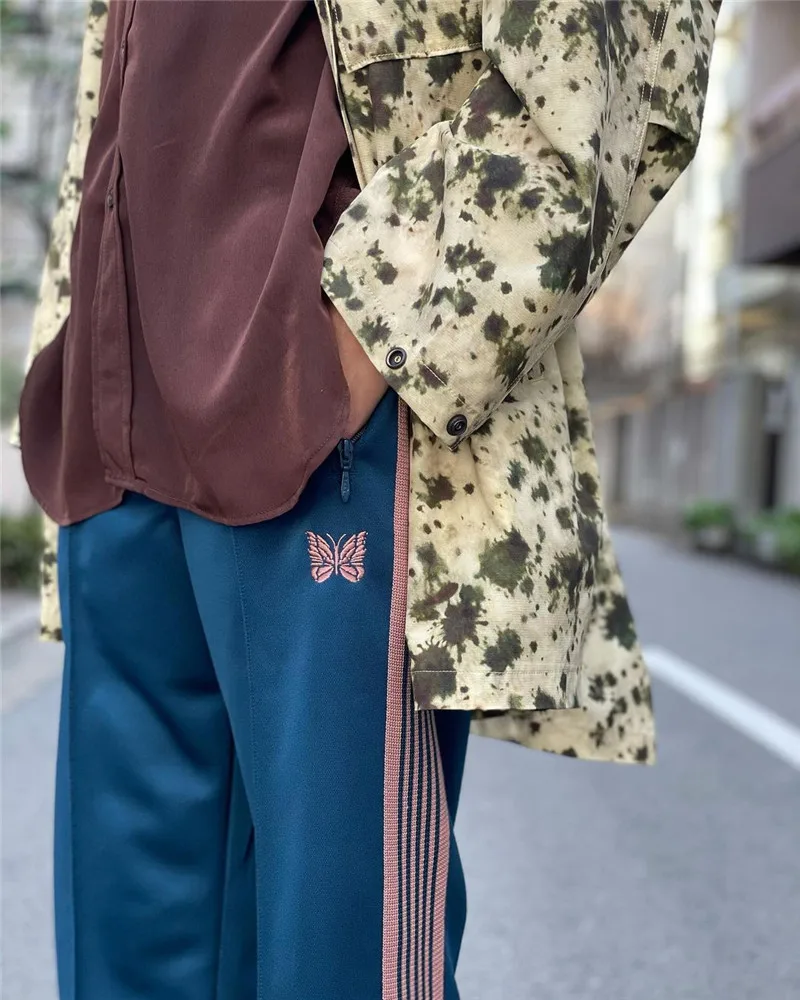 Sea Blue Needles Pants Men Women Stripe Butterfly Embroidery Logo Ribbon Needles Track Pants High Street Trousers
Sea Blue Needles Pants Men Women Stripe Butterfly Embroidery Logo Ribbon Needles Track Pants High Street Trousers