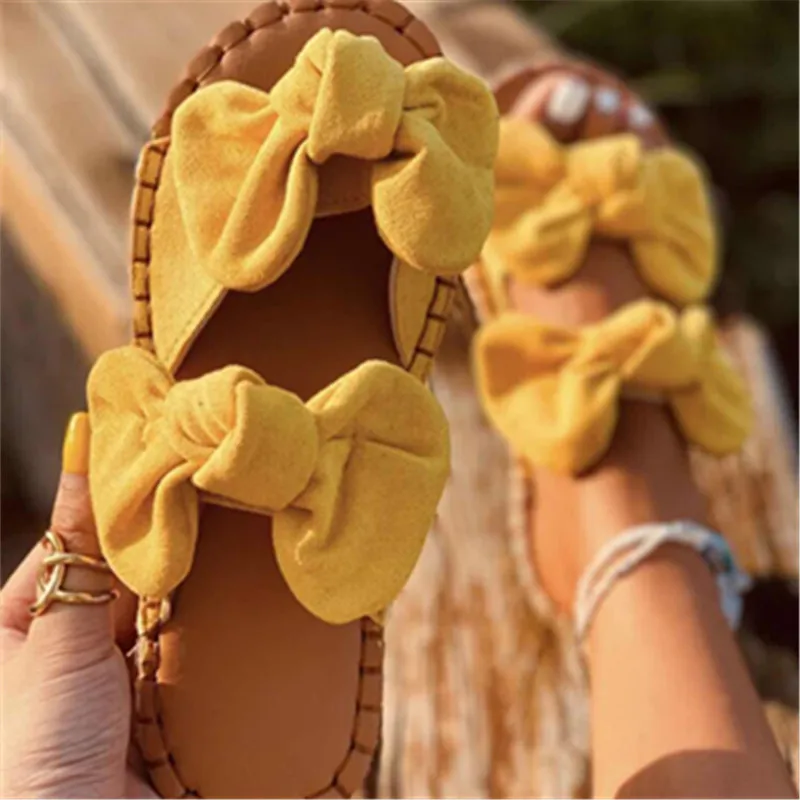 Шлепанцы женские с бантиком, летняя пляжная обувь на плоской подошве, сланцы, домашняя обувь
Шлепанцы женские с бантиком, летняя пляжная обувь на плоской подошве, сланцы, домашняя обувь