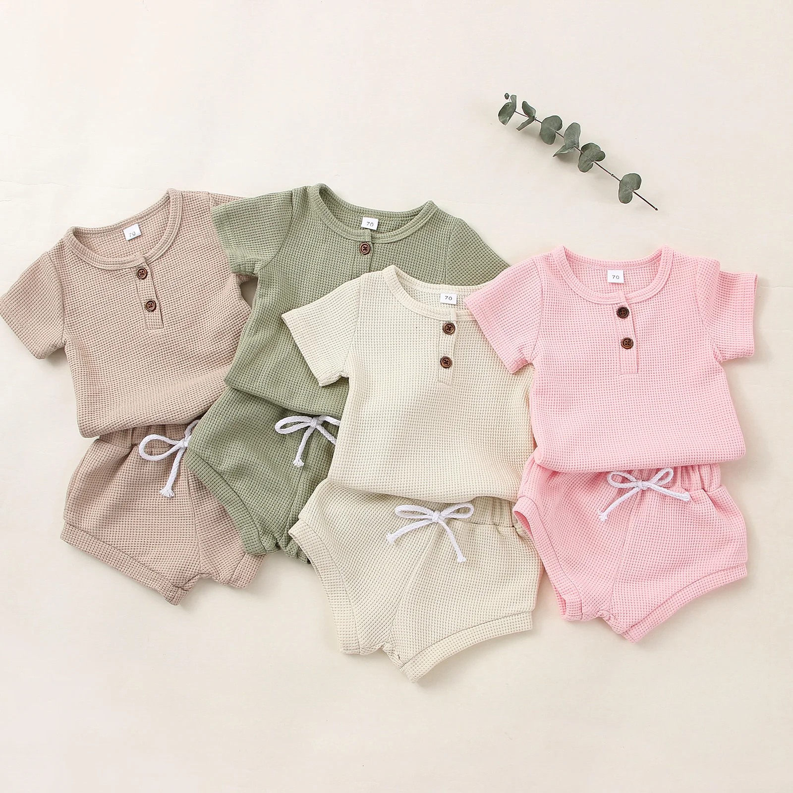 Kids Baby Clothing 2PCS Solid Color Pants Suit Short Sleeve Plain Buttons O-Neck T-Shirts High Waist Tie-Up Triangle Short Pants
Kids Baby Clothing 2PCS Solid Color Pants Suit Short Sleeve Plain Buttons O-Neck T-Shirts High Waist Tie-Up Triangle Short Pants